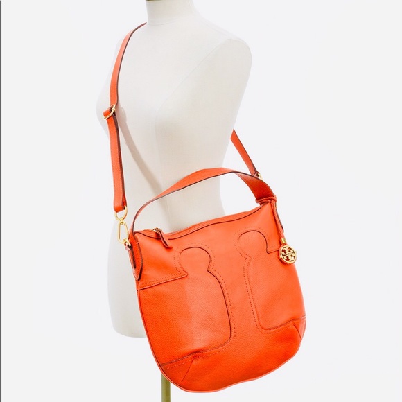 Tory Burch
Gorgeous fire orange Tory Burch Set!!! Bag $350 now - Picture 3 of 7